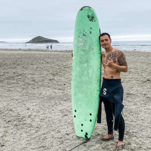 Anthony Surfing in Tofino - Sarah Griffiths Hu